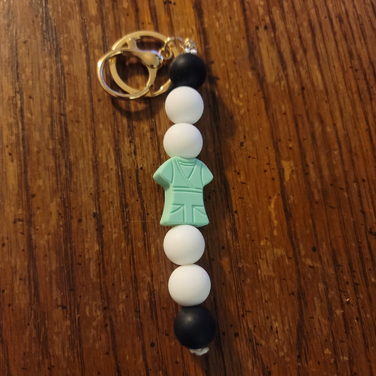 Black and White With Teal Scrub Focal Keychain