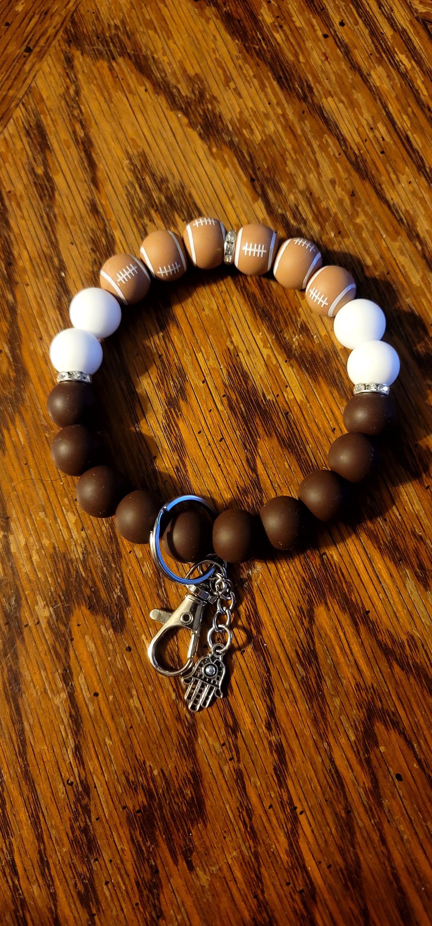 Brown and White Football Wristlet