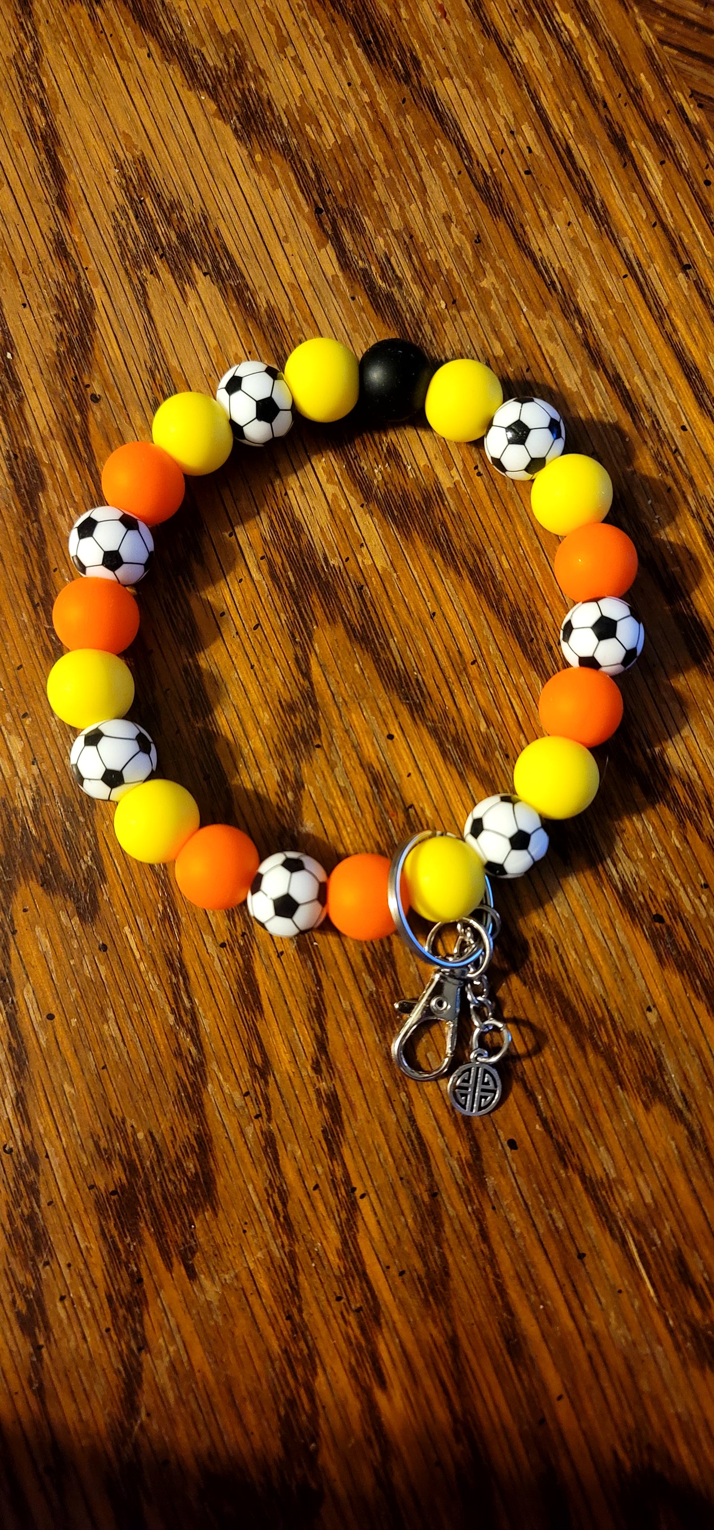 Orange and Yellow With Soccer Ball Bead Wristlet